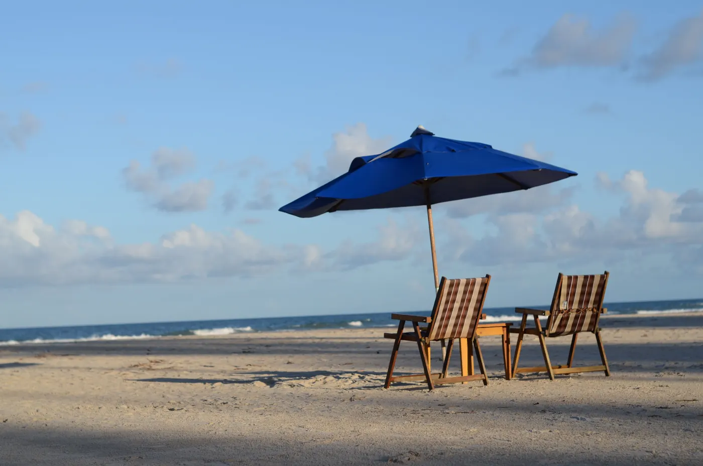 Beach chairs and umbrella